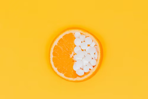 slice of a lemon with tablets on it