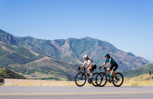 cycling group ride through mountain scenery